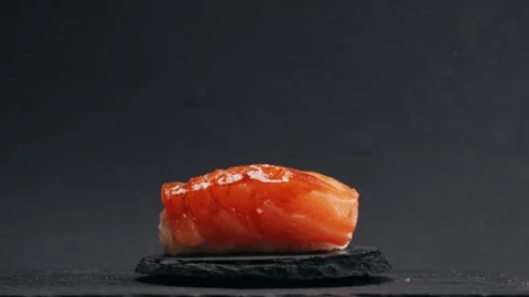 Chef cooking Sashimi Nigiri Platter with flambe fire, japanese sushi restaurant Stock Footage 285436503