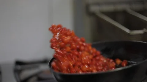 Chef Cooking a Sauce of Aromatic Red Chili Stock Footage 129334102