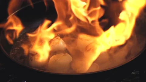 The chef is cooking scallops. Stock Footage 130988967