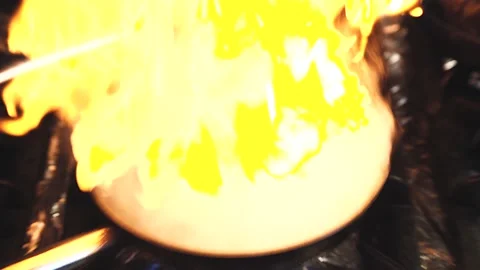 The chef is cooking scallops Stock Footage 130988973