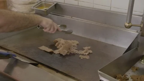Chef Cooking Sliced Meat on Flat Grill in Sydney Restaurant Kitchen Stock Footage 345655980