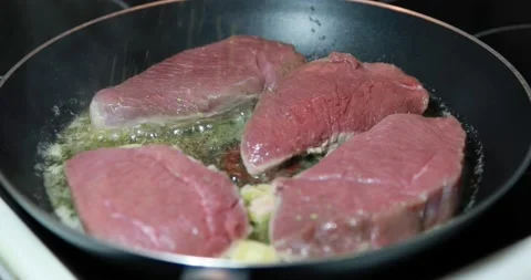 Chef Cooking Steak in the Pan Stock-Footage 140140868