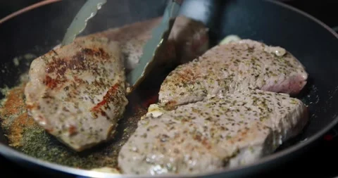 Chef Cooking Steak in the Pan Stock-Footage 140143118