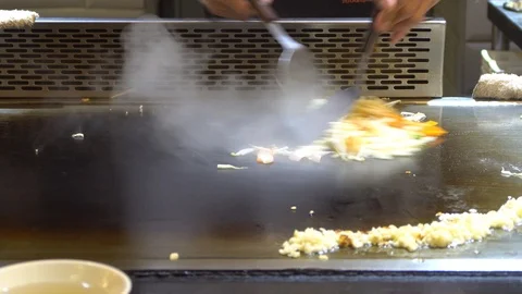 Chef cooking Teppanyaki, close up. Video stock 89389066