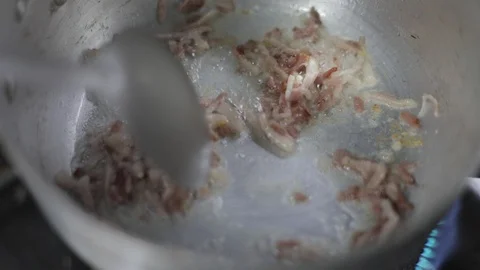 Chef Cooking Thin Slices of Bacon Stock Footage 129334292