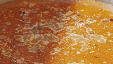Chef Cooking traditional Spanish Paella on a stove, food festival in barcelona Stock Footage 252760853