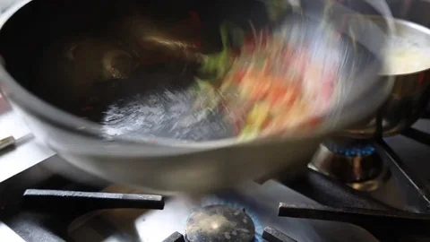 Chef Cooking Vegetables In Wok Pan Stock Footage 83590704