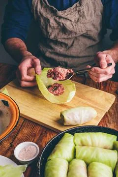 Chef Cooking White Cabbage Stuffed with Ground Meat Stock Photos