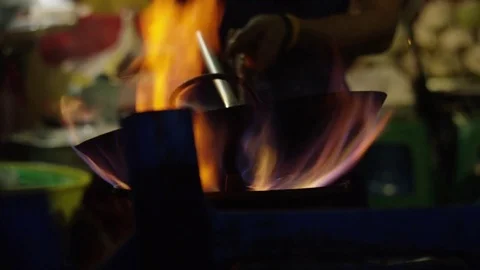 Chef cooking in the wok in restaurant kitchen Stock Footage 73243003