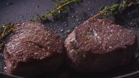 Chef cooks beef steak on fire, wholesome food Stock Footage 116688127