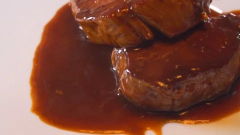 Chef cooks beef steak on fire, wholesome food Stock Footage 116688180