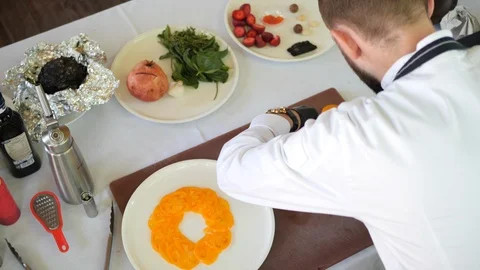 Chef cooks a dish of fresh vegetables. Stock Footage 116769124