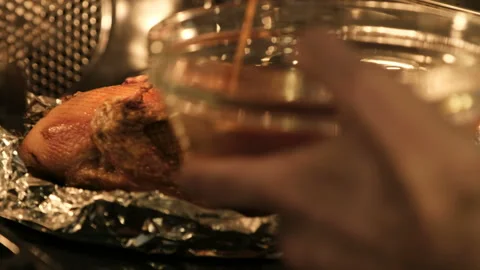 The chef cooks a duck in the oven Stock Footage 96380554
