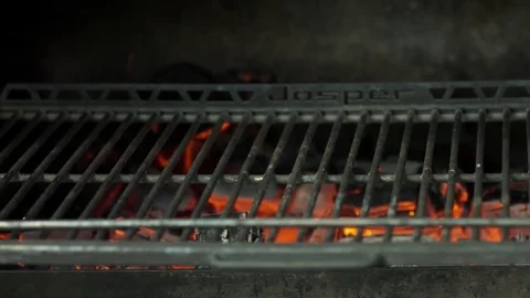 Chef cooks the fish on the grill in the restaurant Stock Footage 79710353