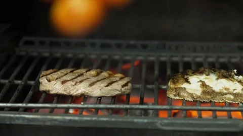 Chef cooks fish, meat and vegetables on the grill in the restaurant Stock Footage 79710622