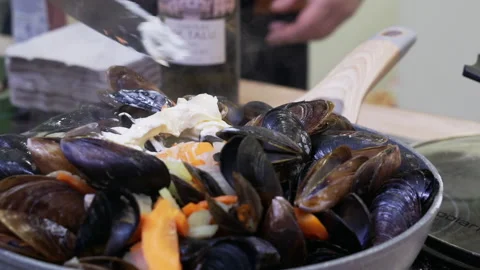 The chef cooks mussels in shells. Stock Footage 171855230
