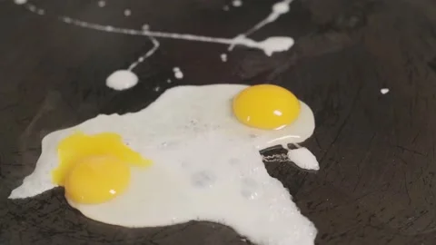 A Chef Cooks Quail Eggs On A Hot Frying Pan Stock Footage 157991497