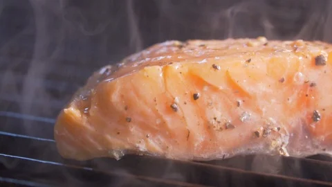 Chef cooks red fish on the grill, wholesome food, salmon Stock Footage 116687609