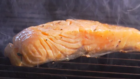 Chef cooks red fish on the grill, wholesome food, salmon Stock Footage 116687849