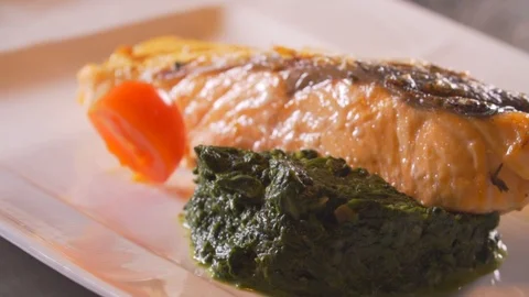 Chef cooks red fish on the grill, wholesome food, salmon Stock Footage 116688627