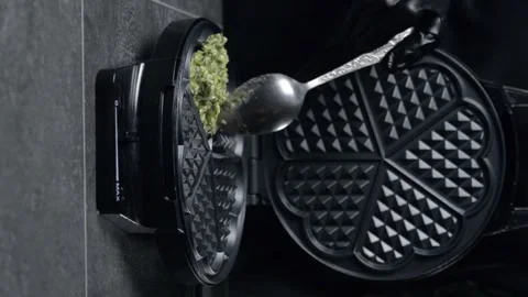 Chef cooks zucchini waffles Stock Footage 248775786