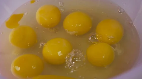 Chef cracking an egg in a bowl Stock Footage 73805661