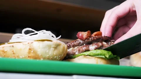 Chef creating a beef burger  Stock Footage 201894544