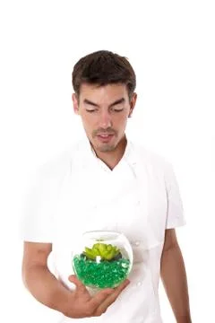 Chef curiously looking at the meal Stock Photos