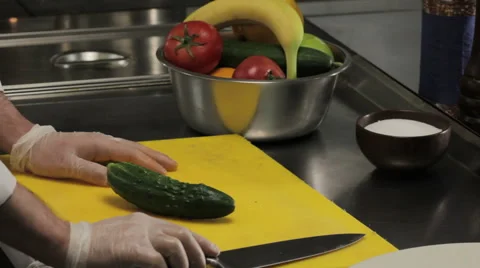 Chef curving a cucumber, close up Stock Footage 66064844