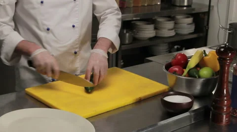 Chef curving a cucumber, medium shot Stock Footage 66063796