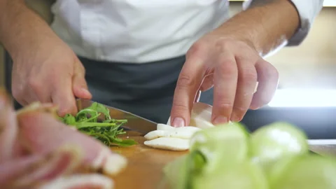 Chef Cut Cheese Mozzarella With a Knife On Cutting Board In Restaurant Kitchen. Stock Footage 151922601