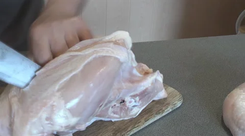 Chef cut up chicken in the kitchen Stock Footage 46686337