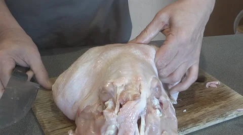 Chef cut up chicken in the kitchen Stock Footage 46686345