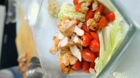 Chef Cut Chicken into Small Pieces. Salad. Transferred to Glass Transparent Bowl Stock Footage 147348913