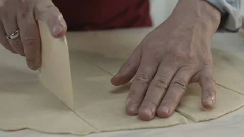 Chef Cut Dough on Portion with Kitchen Utensil Stock Footage 165497742