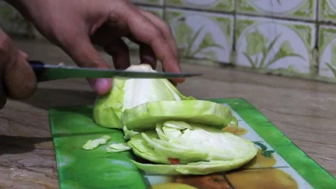 Chef Cut Full Cabbage on Cutting Board HD Stock Footage 132364911