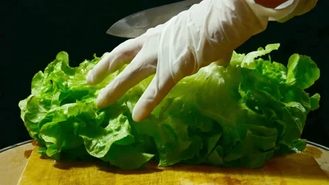 Chef cut half the green oak vegetables Stock Footage 154925536
