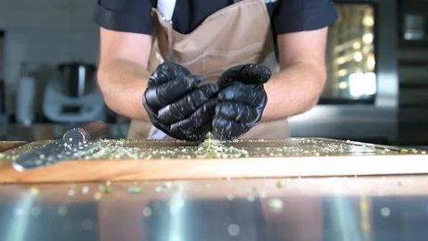 The chef cut the pumpkin seeds Stock Footage 97881044