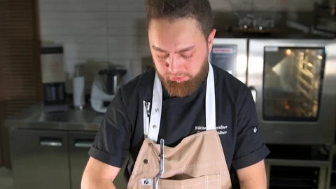 The chef cut the pumpkin seeds Stock Footage 97881051
