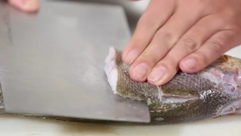 Chef cut yellow croaker with a knife (5) Stock Footage 202205991