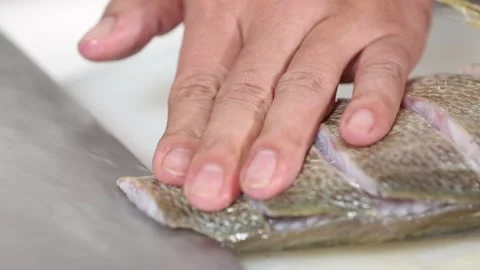 Chef cut yellow croaker with a knife (6) Stock Footage 202206020