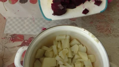 The chef cuts beets with a knife Stock Footage 165612064