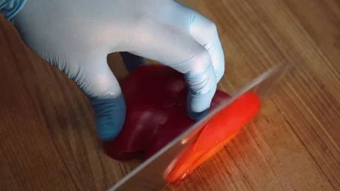 The chef cuts the bell pepper Stock Footage 158021693