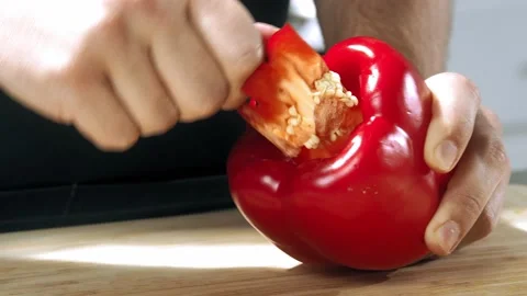 Chef cuts the Bell pepper slow motion Stock Footage 146750588