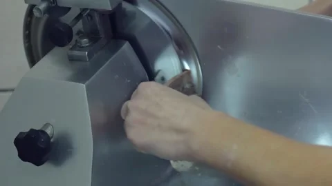 Chef cuts boiled beef meet with a slicer Video stock 143777018