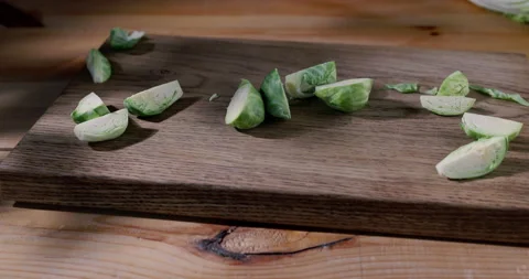 The chef cuts Brussels sprouts. Stock Footage 195930950
