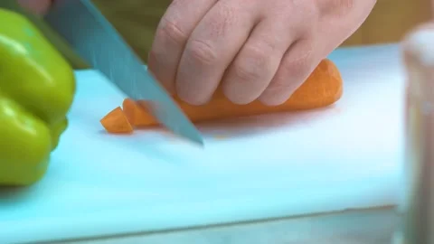 Chef cuts carrot Stock-Footage 134468960