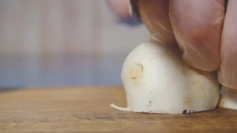 Chef cuts the champignon in small pieces Stock Footage 73816329