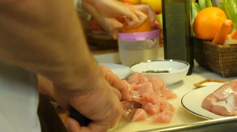 Chef cuts chicken breast Stock Footage 68457115