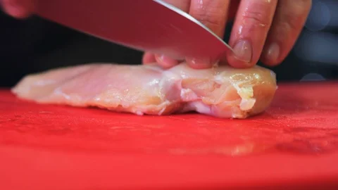 Chef Cuts Chicken 動画素材 125347981